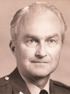 Col. Lucien Rising, U.S. Army (Ret.)